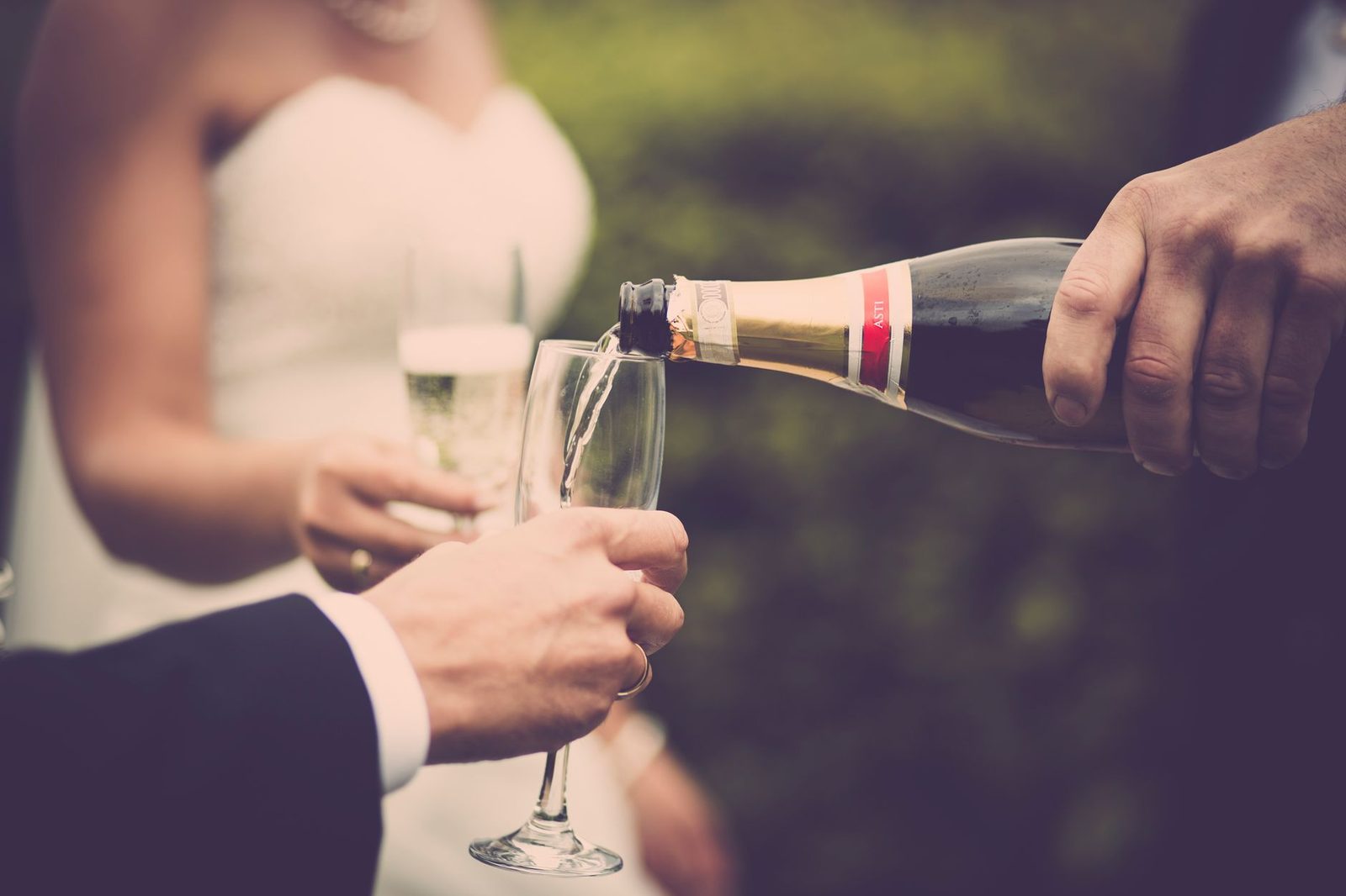 Close-up of a wedding champagne toast, capturing the celebratory mood of the event.