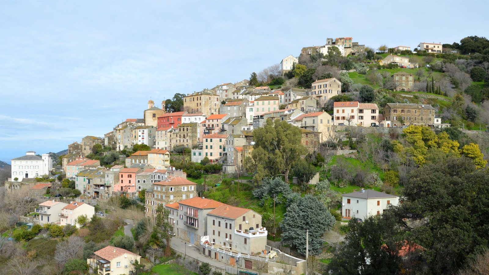 A picturesque view of the historic mountain village of Oletta, Corse, France.