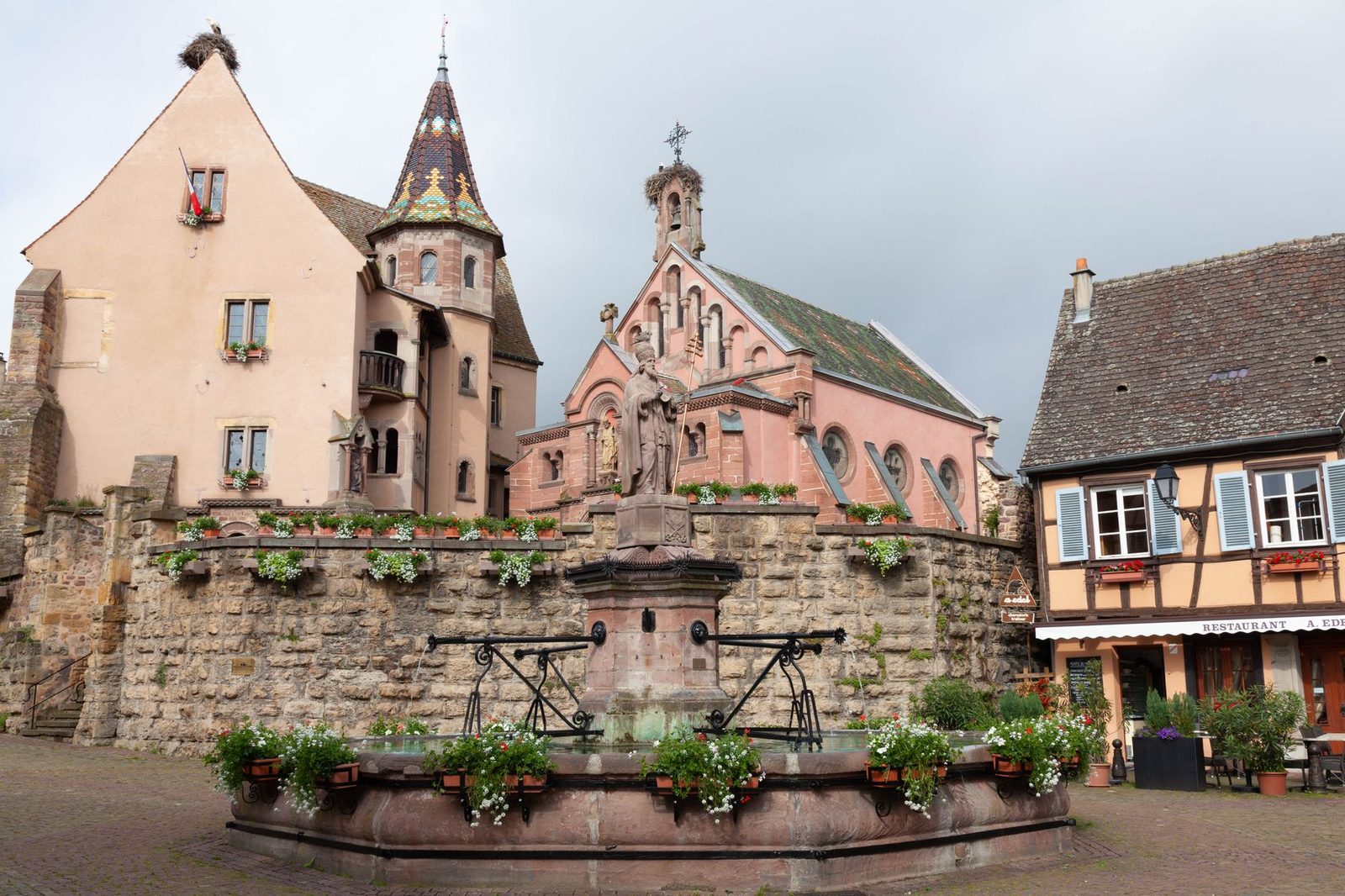 Discover the picturesque Saint Leon Square in Eguisheim, France, showcasing historic architecture and cultural heritage.