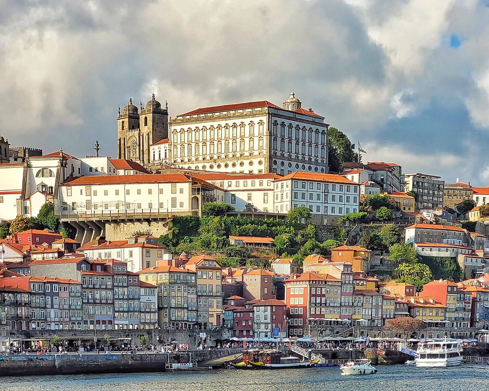 Douro River banks with Porto Cathedral in the background in Porto, Portugal