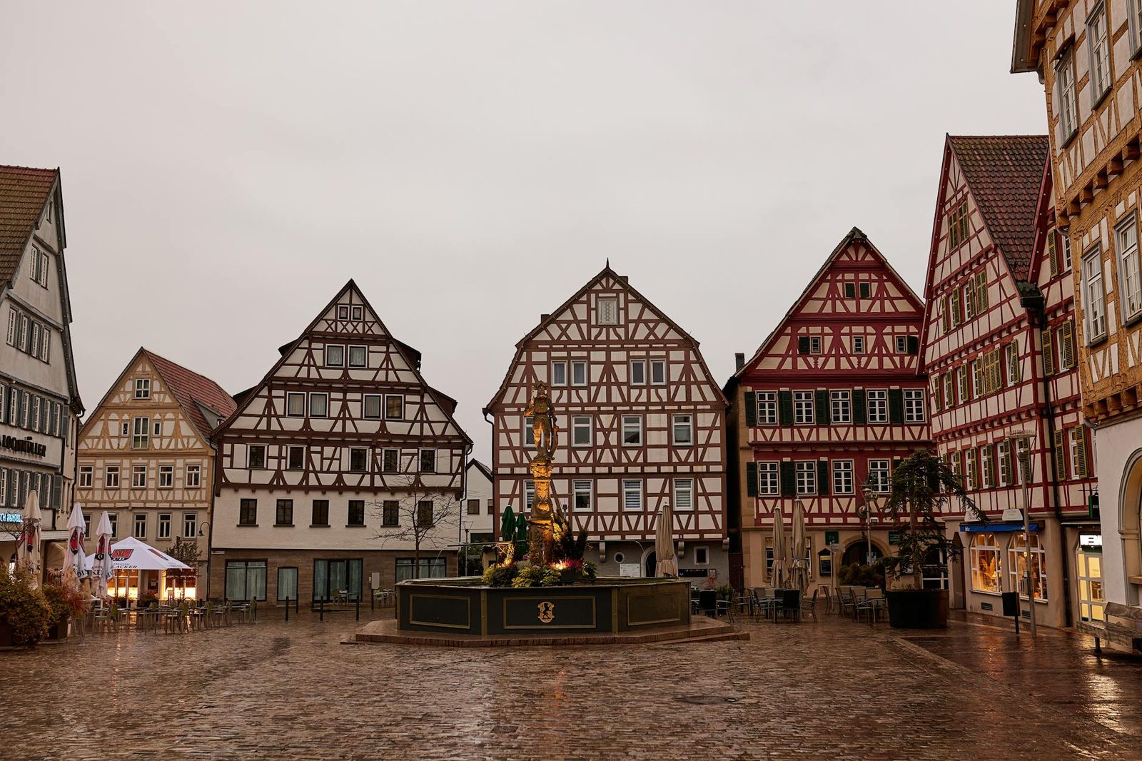 Charming old town square with traditional half-timbered houses in Germany.
