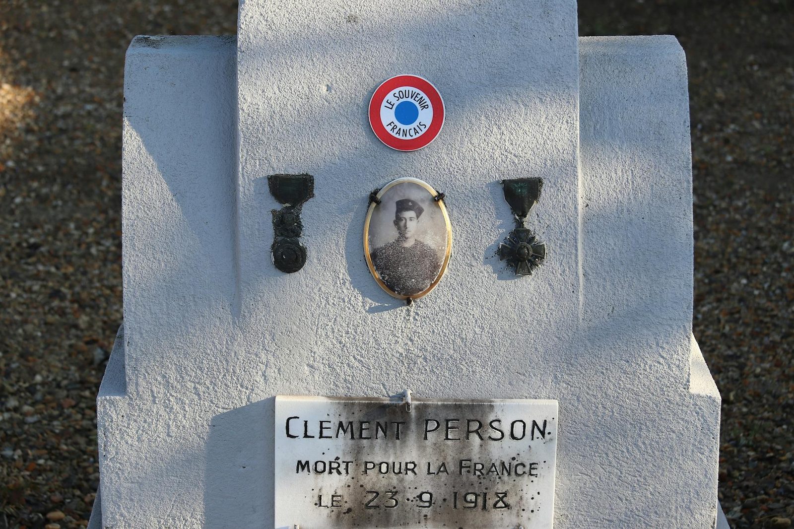 A French war memorial gravestone honoring Clément Person in Pontoise, France.